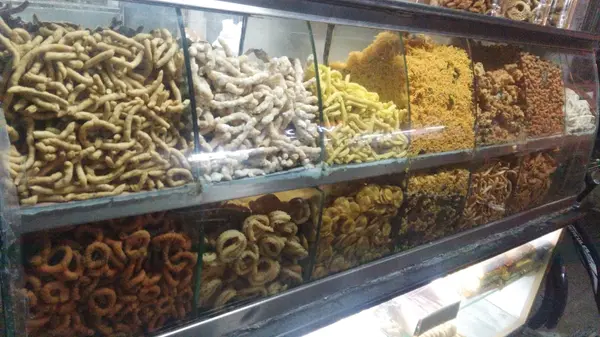 Showcase full of fresh traditional snacks in Vadasery